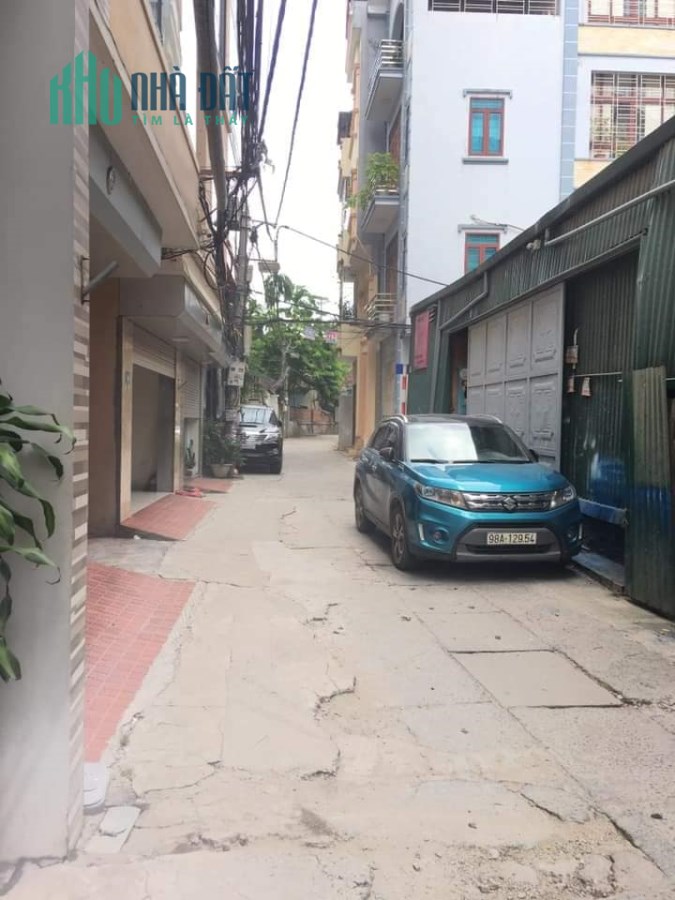 Bán nhà mới xây,ô tô vào nhà,thang máy phố Nguyễn Văn Cừ,75m,6 tầng,giá 8,7 tỷ.