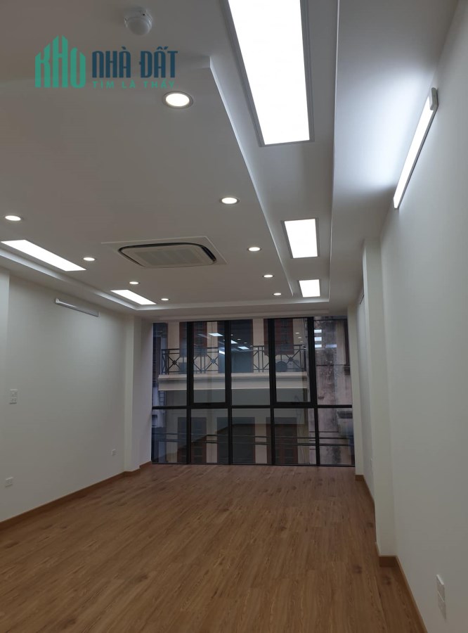 Phố Dương Khuê lô góc MT 5m 65*7T thang máy KD sầm uất dòng tiền 60tr ôtô tránh vỉa hè 3m