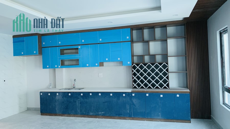 Bán nhà mặt ngõ Vũ Tông Phan, ô tô đỗ trong nhà, 50m2 xây mới 5 tầng, thang máy
