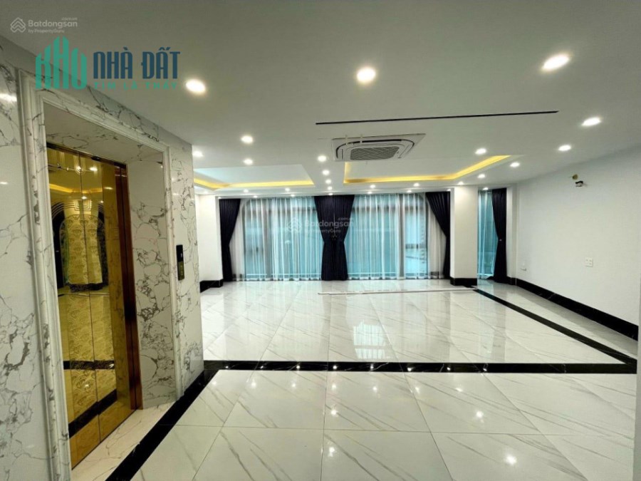 Chủ sốc giảm 2 tỷ, tòa nhà phố Lĩnh Nam, 70m2, 7 T, MT 8m, thang máy, kinh doanh, vỉa hè