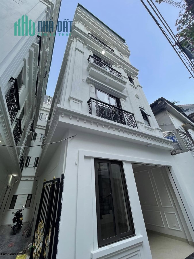 Bán nhà Vũ Ngọc Phan, 6 tầng thang máy, 3 mặt thoáng, ô tô vào nhà, ngõ thông ô tô tránh 6 ngả